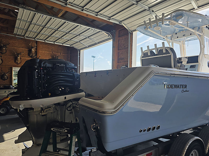 A Tidewater Custom in the shop with the outboard cowl off