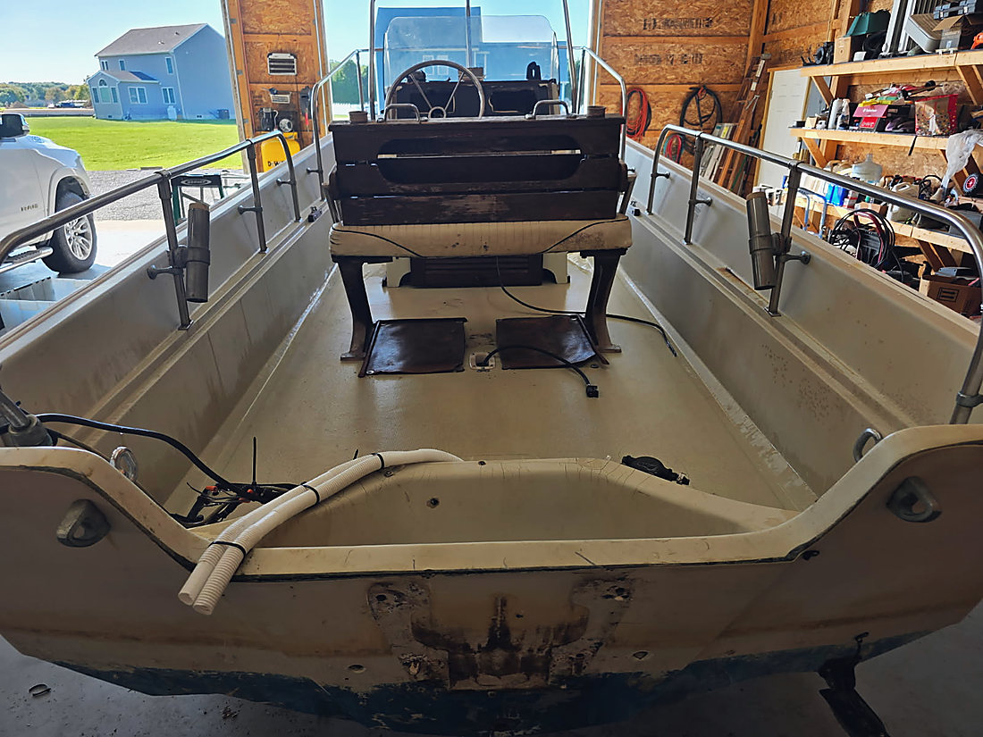 Looking forward from the transom over the open deck toward the console